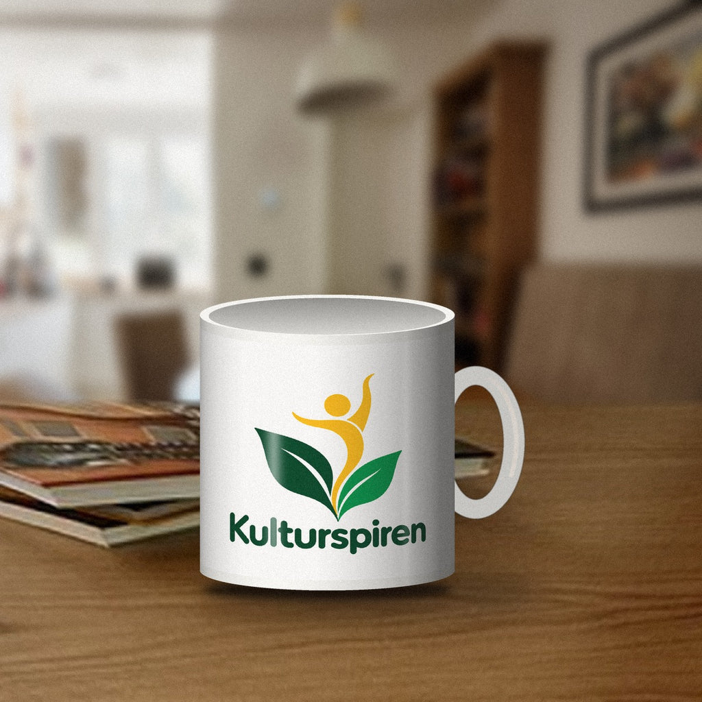 Hvit Kulturspiren-kopp på kjøkkenbordet hjemme